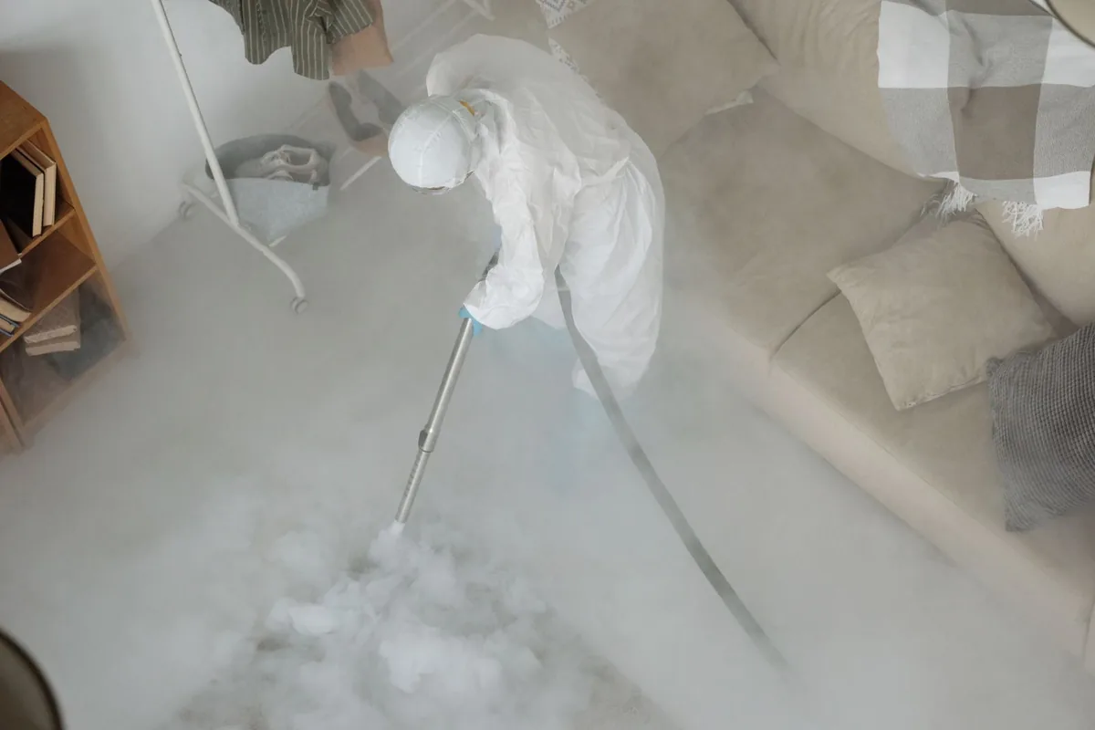 Biohazard cleanup technician in protective equipment, Taunton, MA